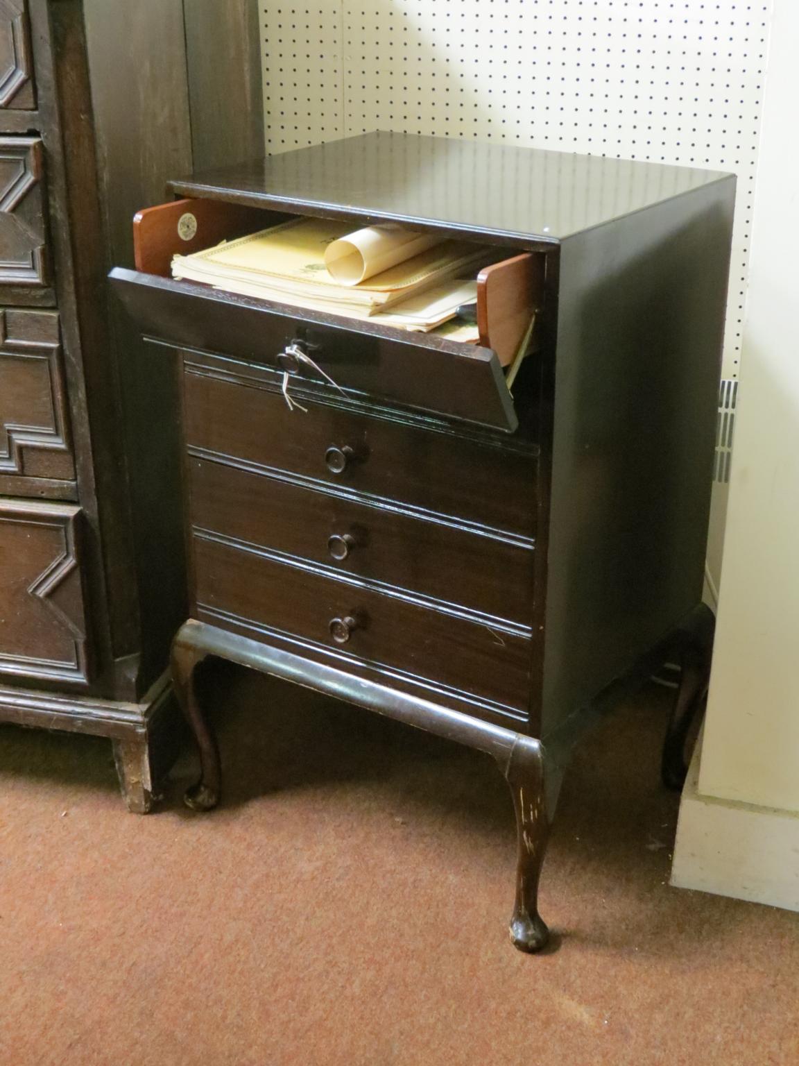 Appraisal: An early th century dark mahogany music chest five fall-front