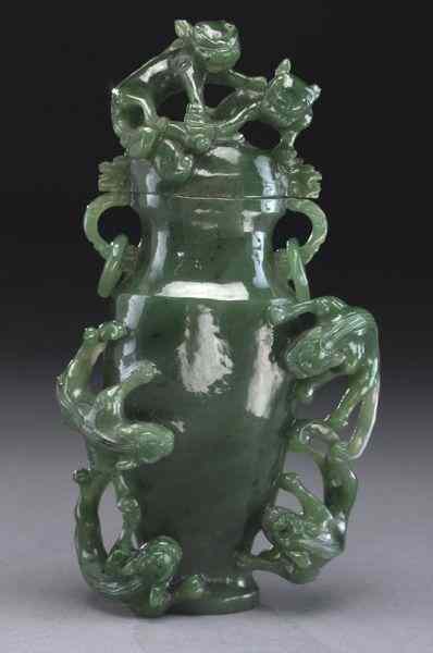 Appraisal: Chinese carved spinach jade vase carved in high relief with