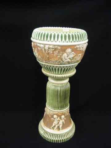 Appraisal: Roseville Donatello Art Pottery Jardiniere pedestal '' tall overall cherub