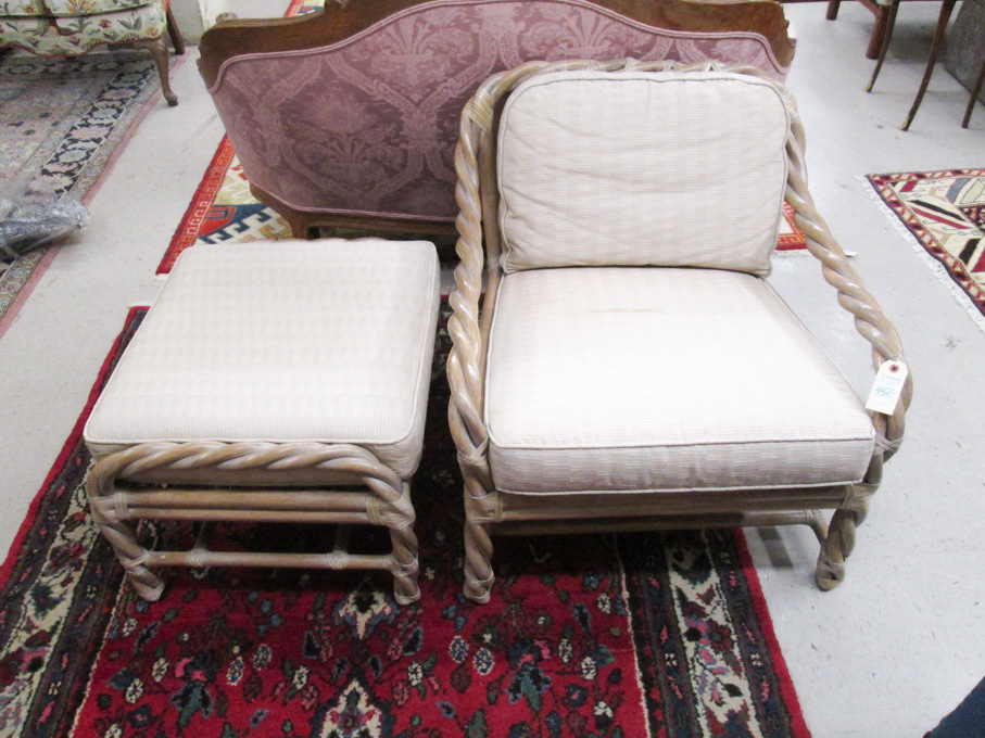 Appraisal: McGUIRE RATTAN ARMCHAIR AND OTTOMAN McGuire Furniture Co San Francisco