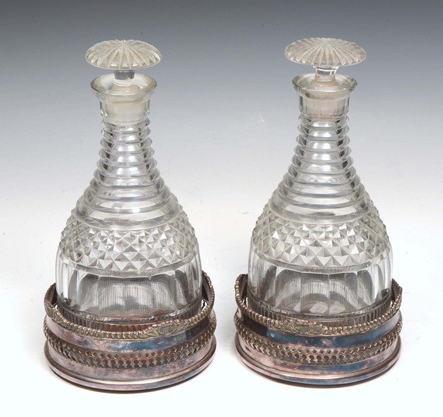 Appraisal: A PAIR OF TH CENTURY HOBNAIL GLASS DECANTERS with mushroom