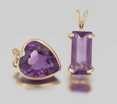 Appraisal: Two Amethysts Pendants Containing a k gold pendant set with