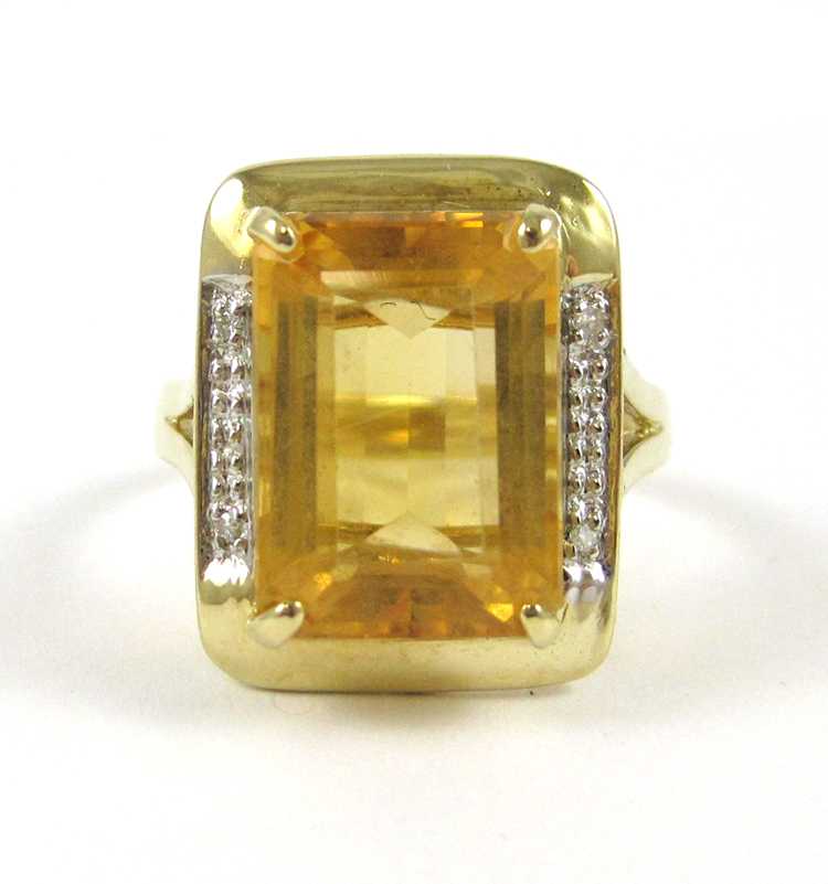 Appraisal: CITRINE DIAMOND AND FOURTEEN KARAT GOLD RING with two round-cut