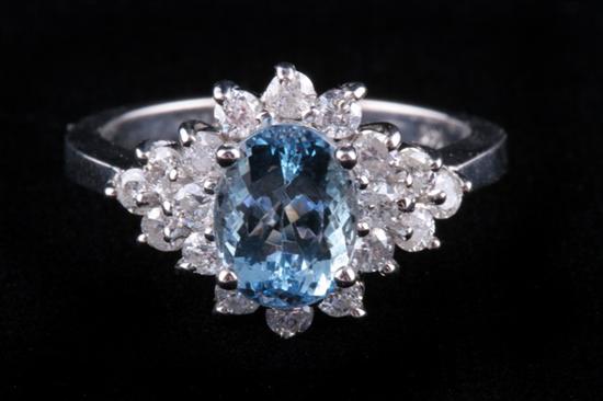 Appraisal: K WHITE GOLD AQUAMARINE AND DIAMOND RING Oval aquamarine weighing