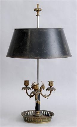 Appraisal: LOUIS XVI-STYLE STEEL AND GILT-METAL THREE-LIGHT BOUILLOTTE LAMP The ebonized