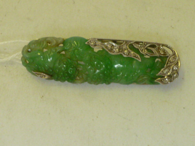 Appraisal: AN ART DECO JADE AND DIAMOND BROOCH the pale green