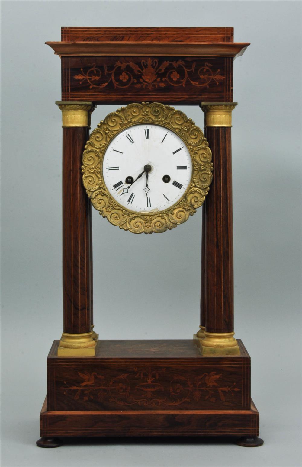 Appraisal: ROSEWOOD MARQUETRY AND BRASS-MOUNTED NEOCLASSICAL STYLE PORTICO CLOCK FRANCE circa