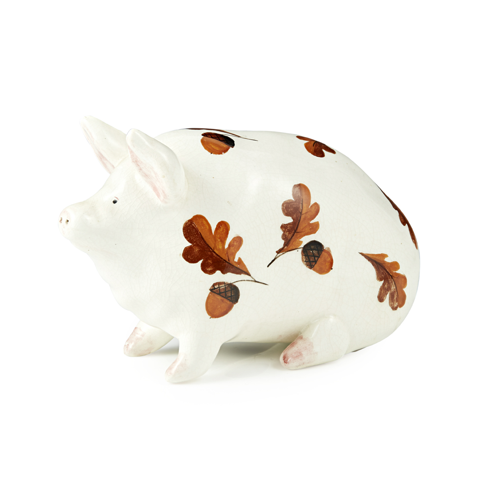 Appraisal: A SMALL WEMYSS WARE PIG 'OAK LEAVES ACORNS' PATTERN POST