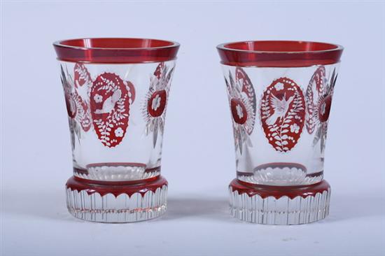 Appraisal: PAIR BOHEMIAN RUBY OVERLAY AND CUT GLASS TRUMPET VASES late