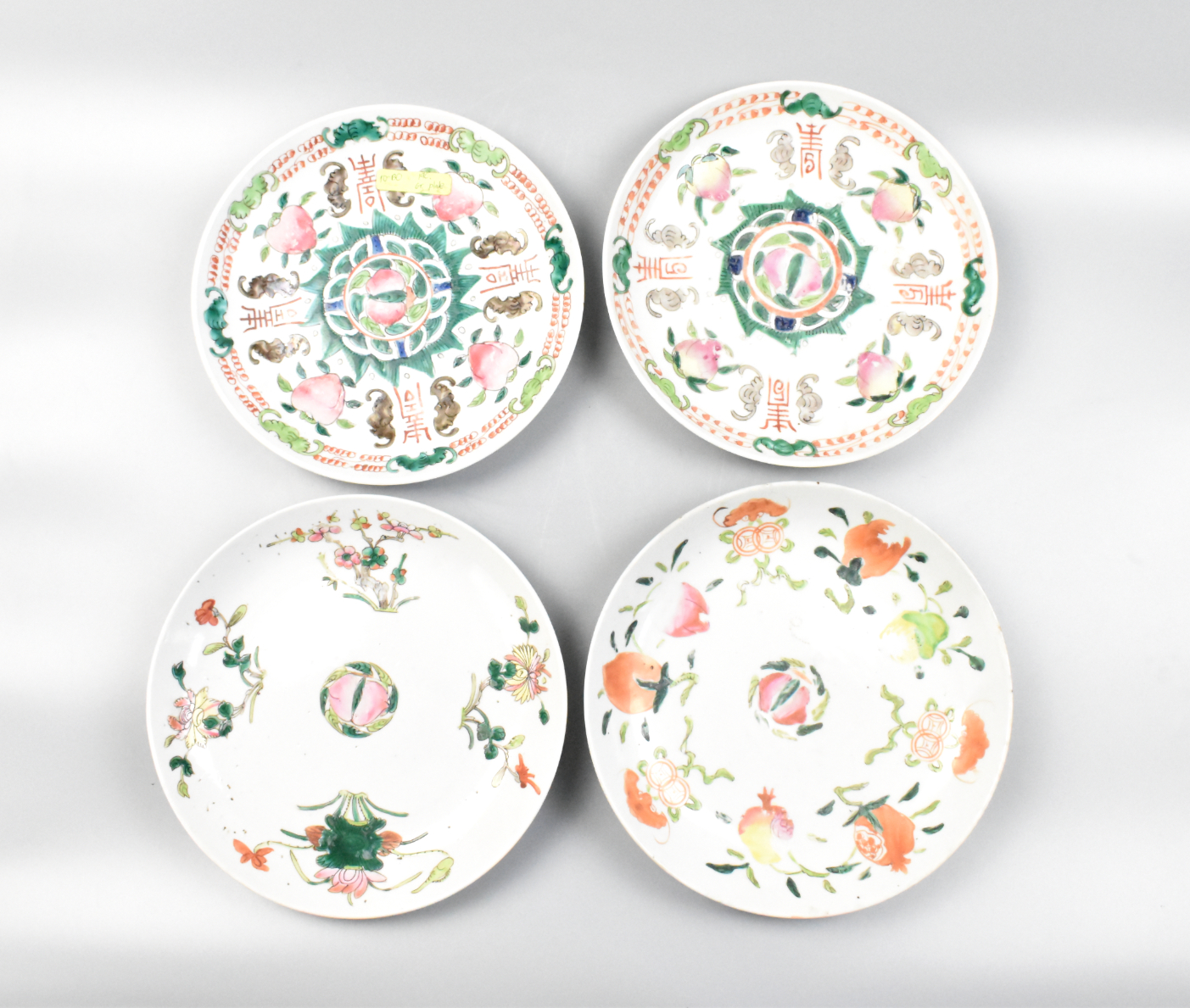 Appraisal: Four Chinese famille rose plates with peach design dating from