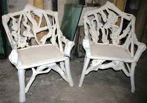 Appraisal: PAIR OF WHITE PAINTED ROOT ARM CHAIRS AND TABLE the