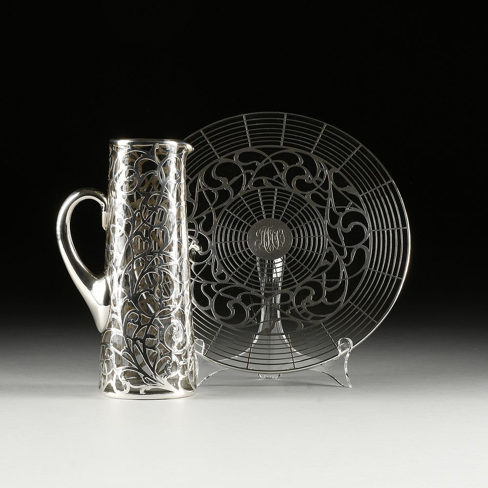 Appraisal: AN ART DECO SILVER OVERLAY GLASS PLATTER AND PITCHER PROBABLY