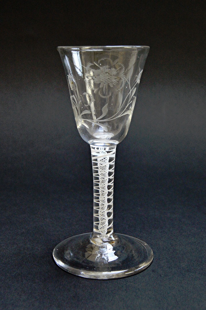 Appraisal: An engraved Jacobite type wine glass circa with rounded funnel