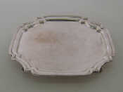 Appraisal: A shaped square silver waiter with re-entrant corners on leaf