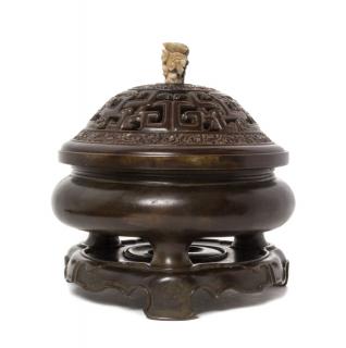 Appraisal: A Bronze Incense Burner A Bronze Incense Burner the compressed