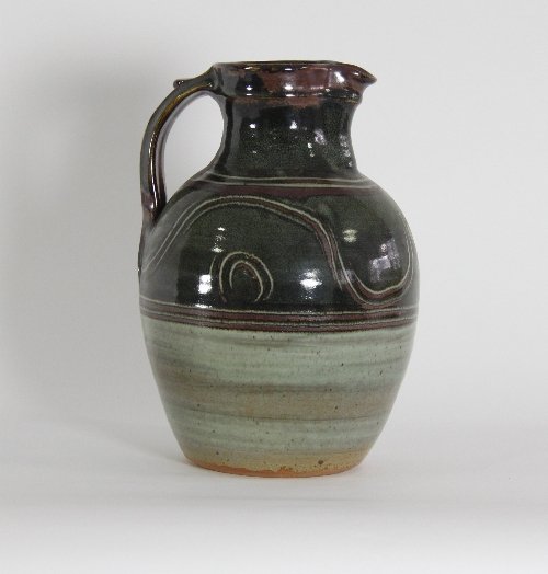 Appraisal: Ray Finch Winchcombe Pottery A jug decorated in coloured glazes