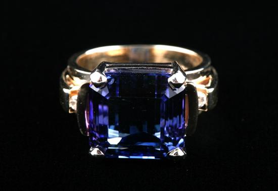 Appraisal: K YELLOW AND WHITE GOLD TANZANITE AND DIAMOND RING Centered