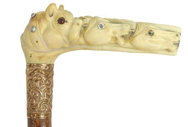 Appraisal: Victorian cane walking stick carved antler L-shape handle with dog