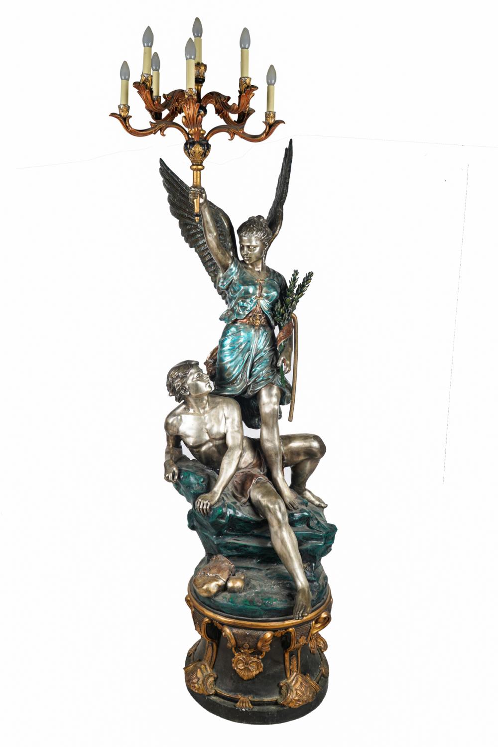 Appraisal: AFTER S KELIAM FIGURAL BRONZE TORCHIEREpolychrome and silvered bronze signed