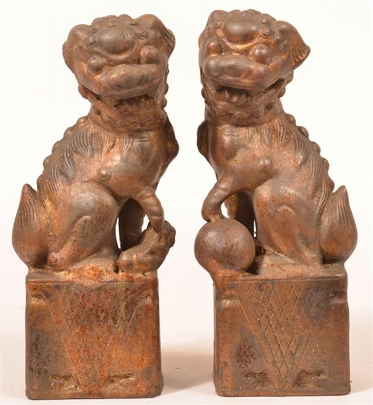 Appraisal: Pair of Oriental Cast Metal Foo Dogs Pair of Oriental