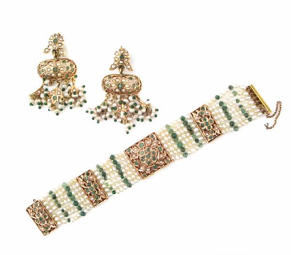 Appraisal: A cultured pearl emerald bead and gold bracelet with matching