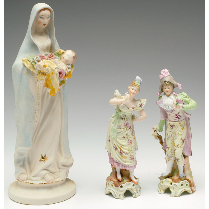 Appraisal: Bisque figurine Madonna and child with garland of red and