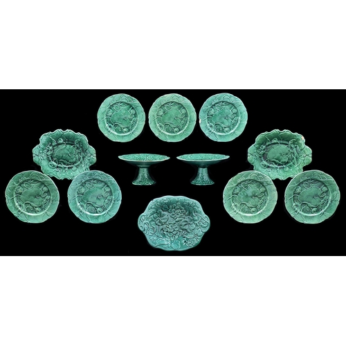 Appraisal: A Staffordshire green glazed and leaf moulded earthenware dessert service