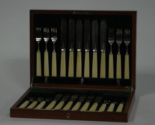 Appraisal: A set of silver fish knives and forks Goldsmiths and