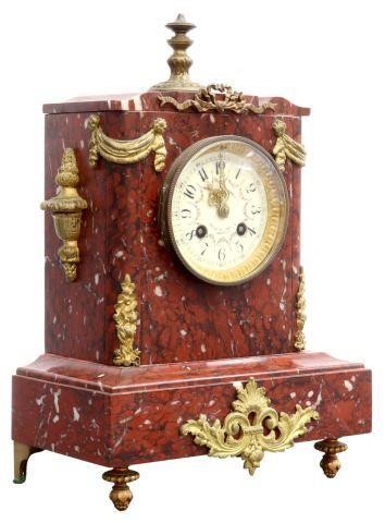 Appraisal: French rouge marble cased clock th c embellished with brass