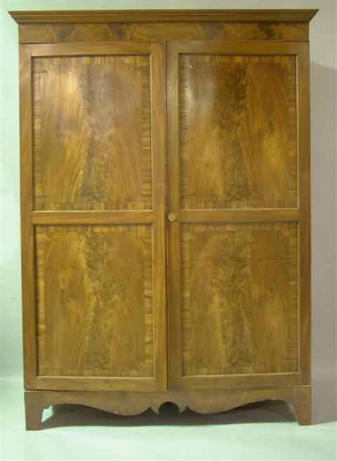 Appraisal: LARGE ENGLISH MAHOGANY ARMOIRE th century the molded cornice over