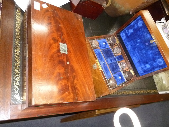 Appraisal: A VICTORIAN ROSEWOOD VANITY CASE with blue velvet fitted interior