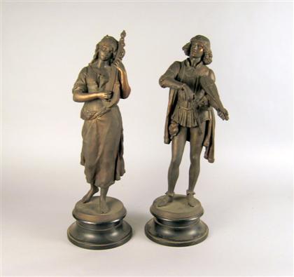 Appraisal: Pair of spelter figures of musicians Each standing figure in