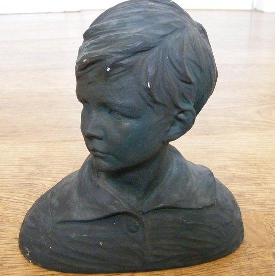 Appraisal: Alec MillerAlastairbust of a boy looking to his rightmarked in