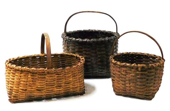 Appraisal: Three th th C splint baskets of graduated size two