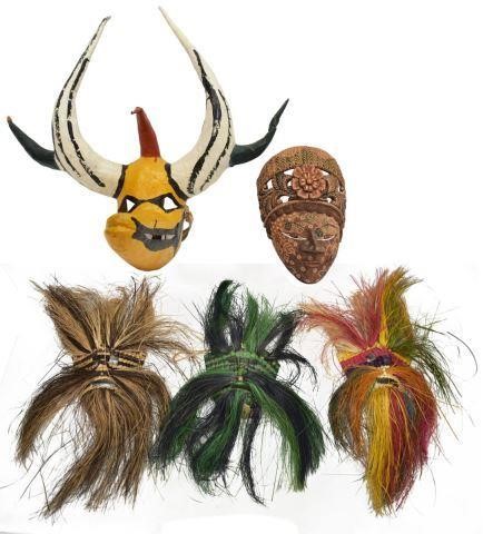 Appraisal: lot of Masks th c including dyed and woven straw