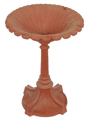 Appraisal: A Coalbrookdale cast iron bird bath red painted the base