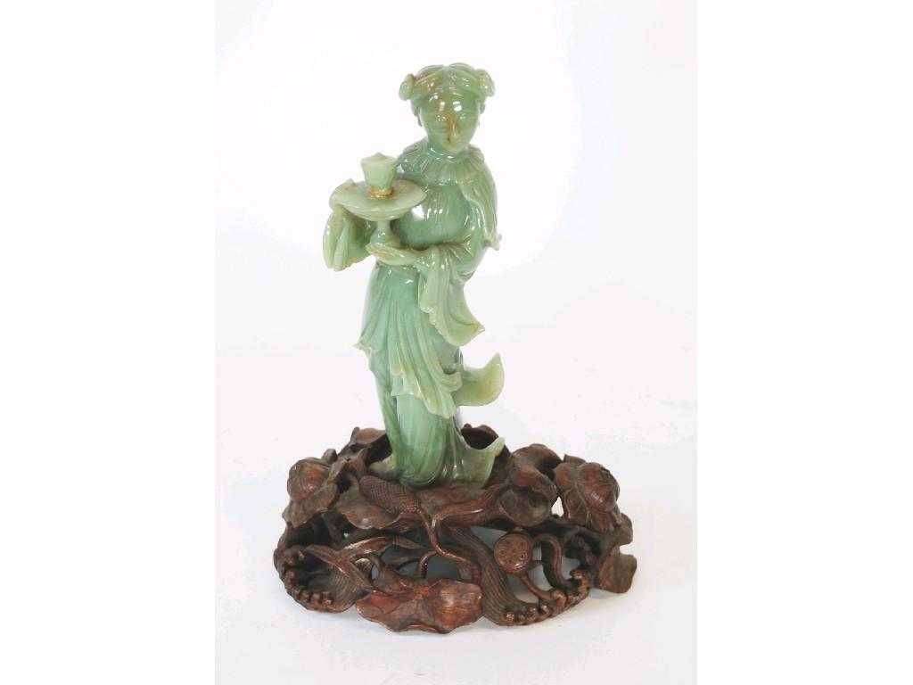 Appraisal: CHINESE CARVED GREEN JADE FEMALE FIGURE HOLDING A TAZZA in