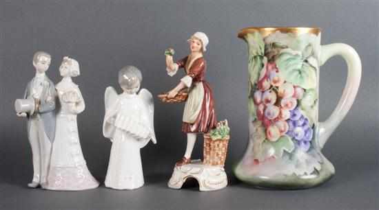 Appraisal: Limoges porcelain bride and groom figural group Goebel flower gatherer