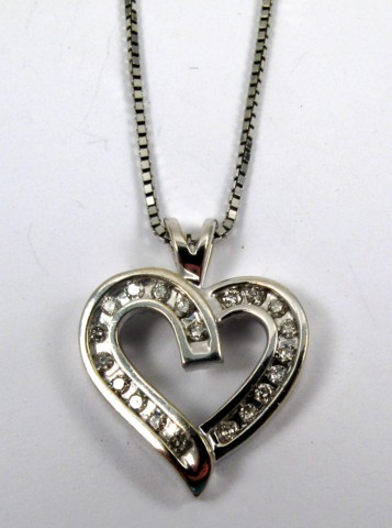 Appraisal: DIAMOND AND WHITE GOLD PENDANT NECKLACE The heart shaped pendant