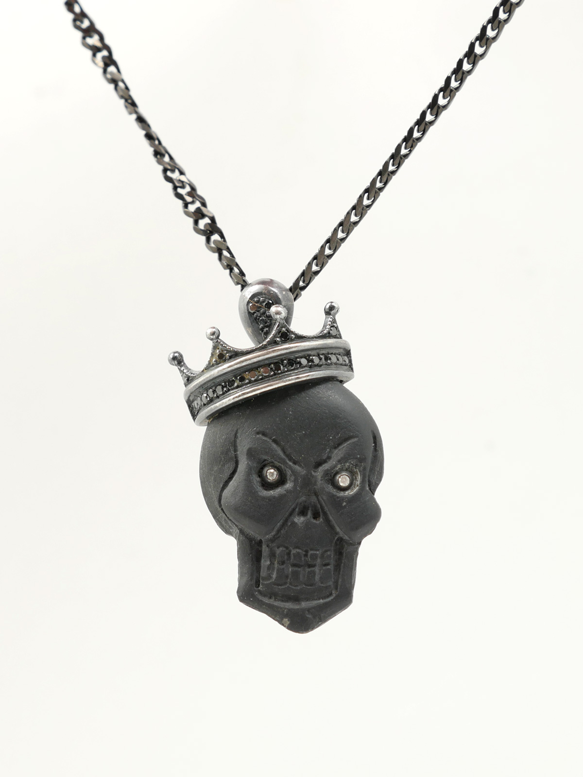 Appraisal: AMEDEO BLACK LAVA SKULL CAMEO PENDANT CHAIN Hand carved ''