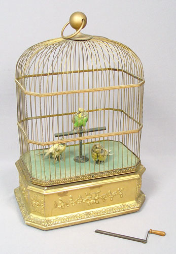 Appraisal: LARGE VICTORIAN SINGING BIRD AUTOMATON taxidermy birds parakeet and two