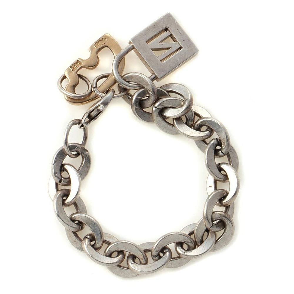 Appraisal: Golden Bear silver gold bracelet with Tiffany lock sterling silver