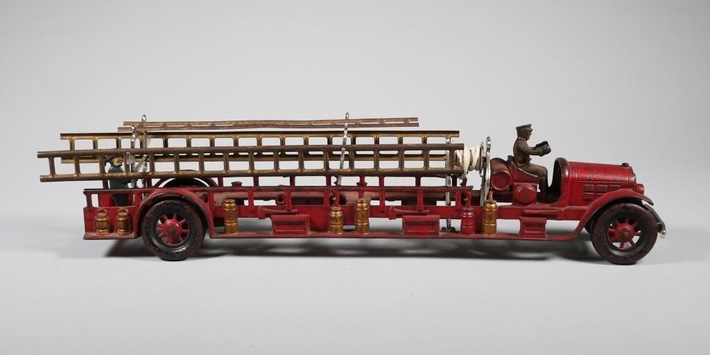 Appraisal: Kenton fire ladder truck approx in length Toy truck has