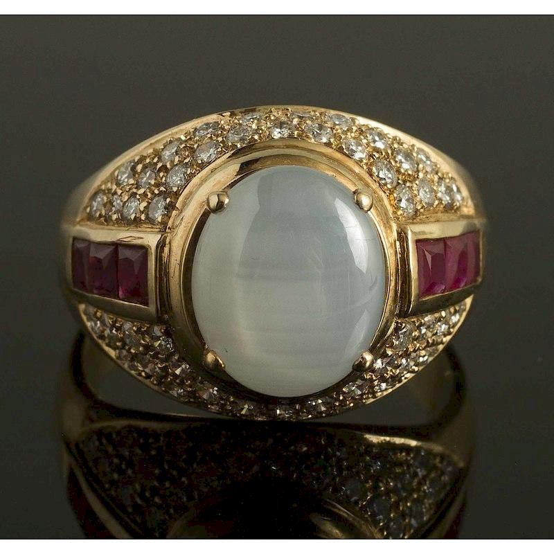 Appraisal: Gray Star Sapphire Ruby RIng k yellow gold ring containing