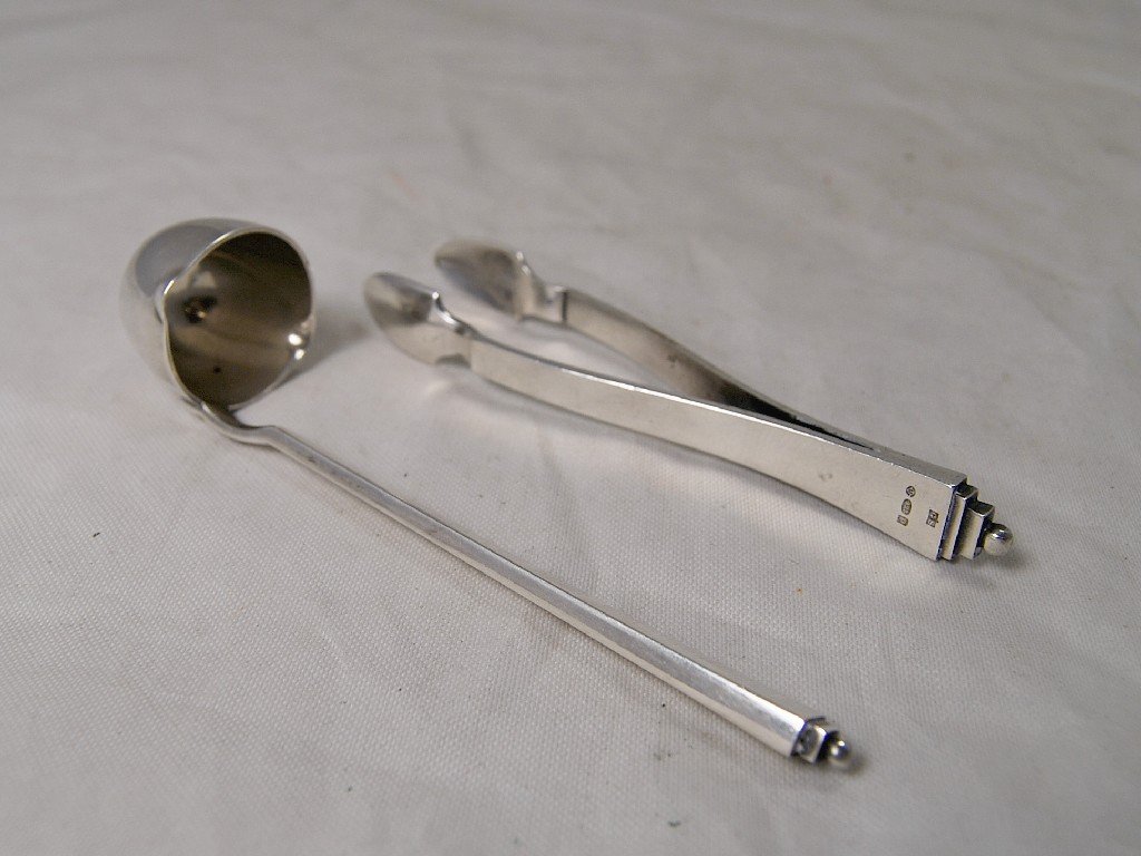 Appraisal: An Art Deco Georg Jensen silver pair of sugar tongs