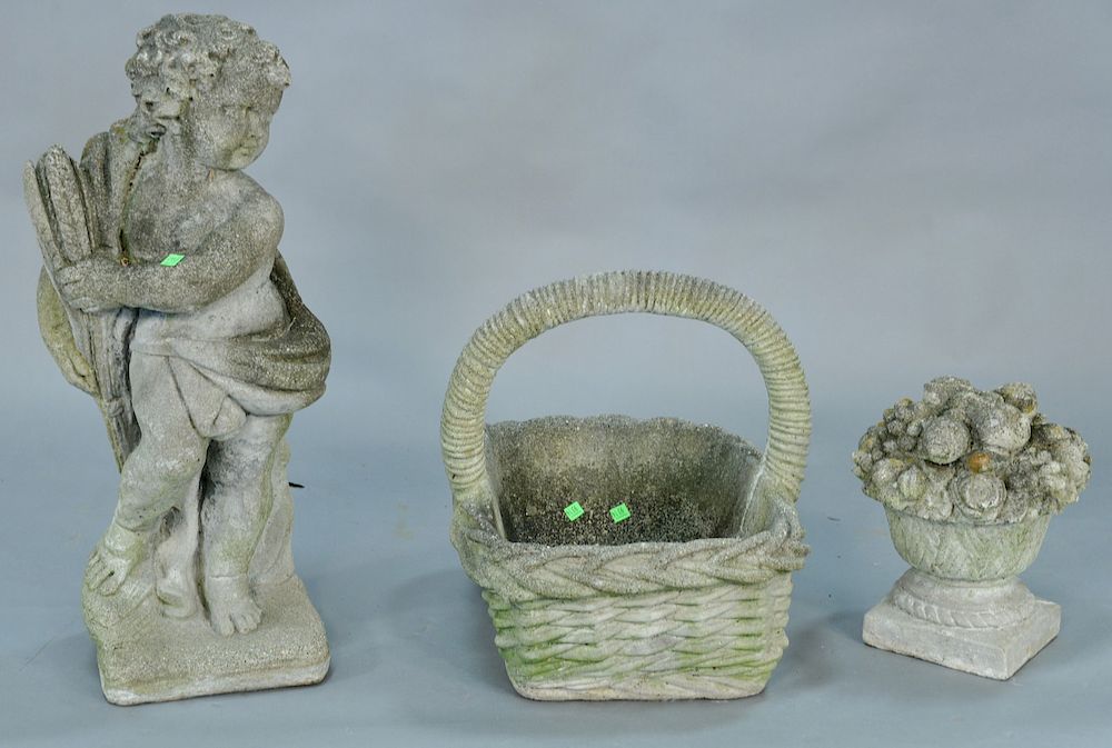 Appraisal: Three cement outdoor pieces including basket puttie ht in and