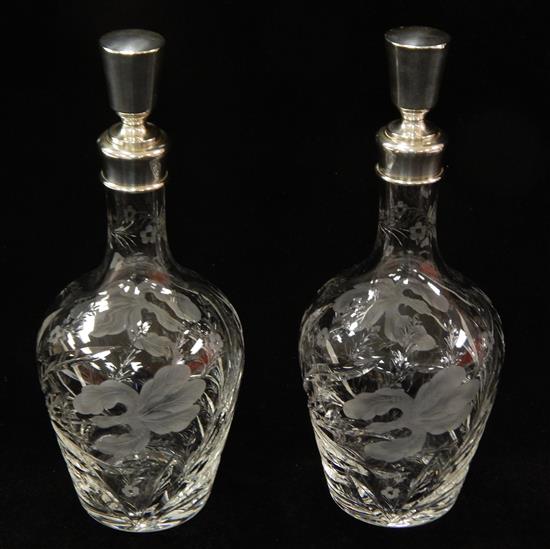 Appraisal: SILVER Pair of Hawkes cut glass and sterling decanters each