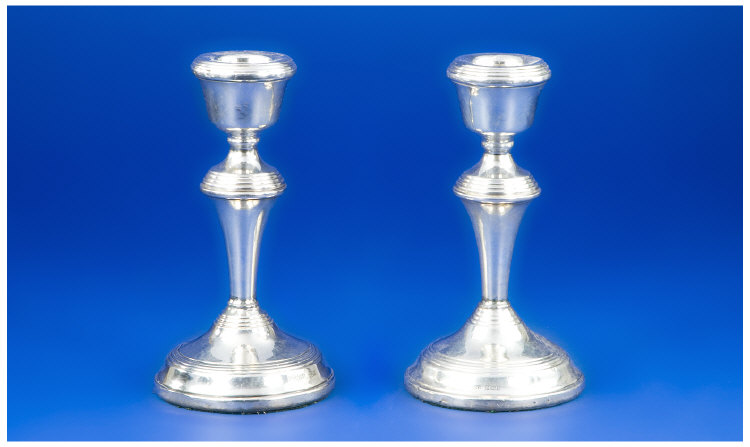 Appraisal: Pair Of Silver Candlesticks Of Circular Tapering Form Raised On