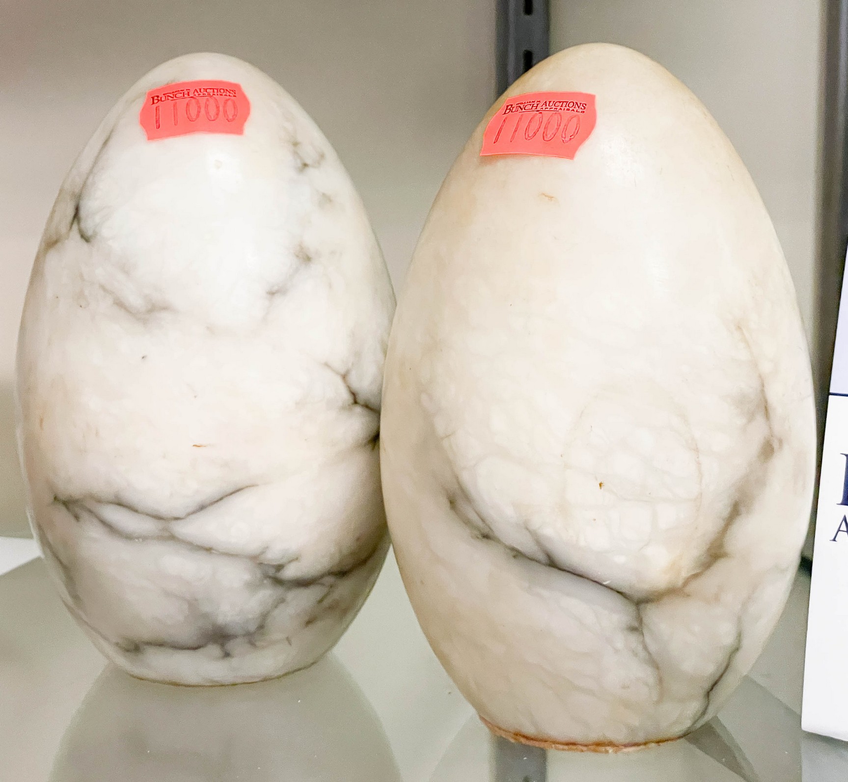 Appraisal: Pair of egg shaped bookends white marble with black veins