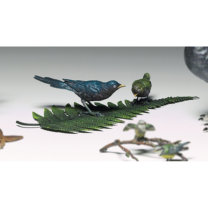 Appraisal: German Austrian figural birds on a leaf colorfully enameled metal